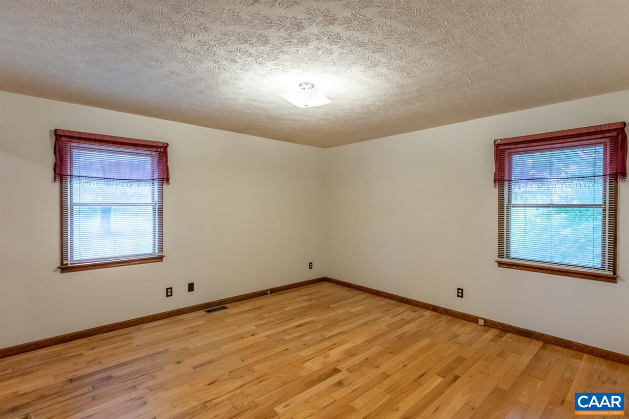 11 Meadow Ridge Road Waynesboro, VA 22980 - Photo 9 of 17 a view of an empty room with wooden floor and a window