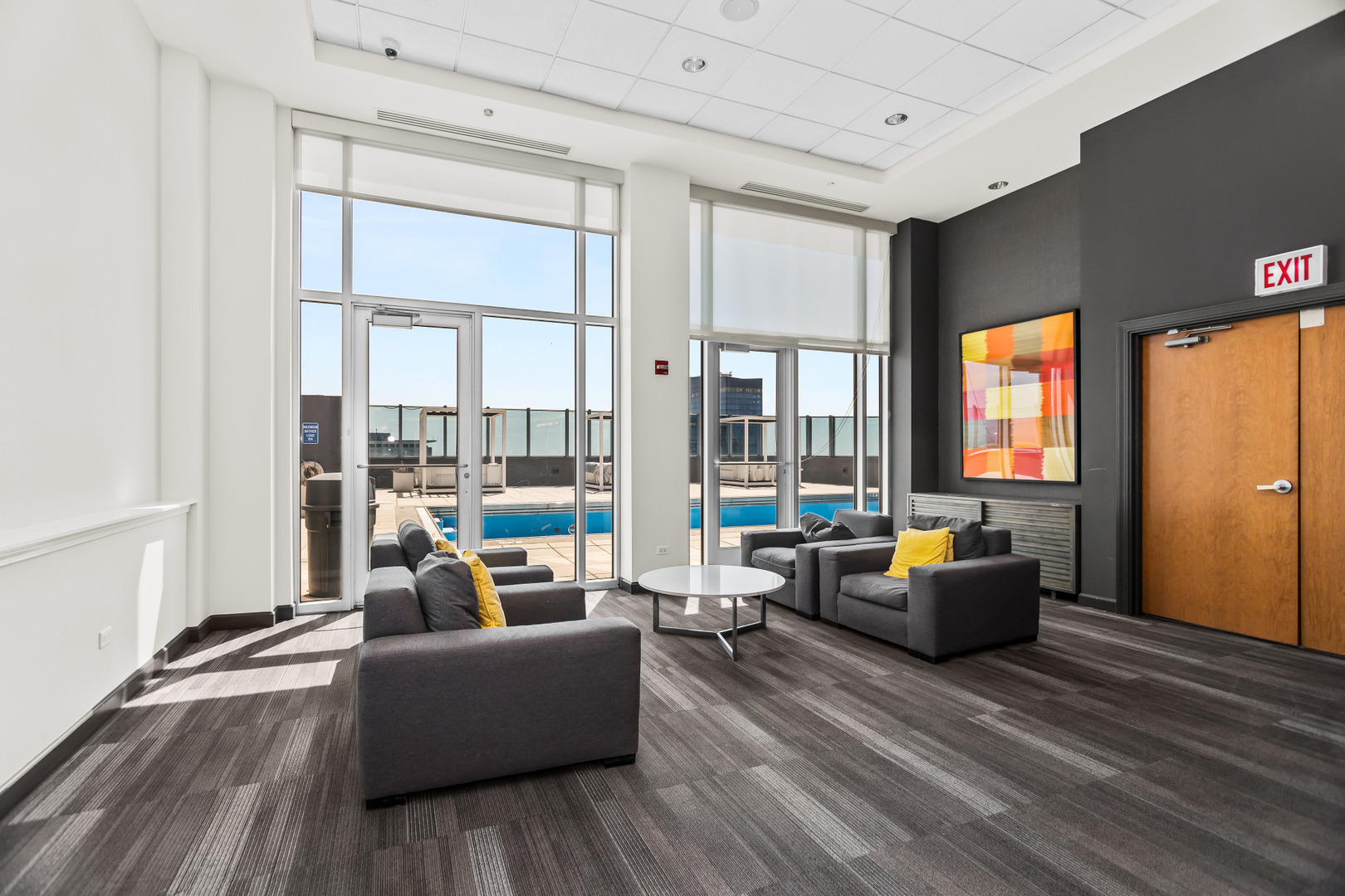 1901 South Calumet Avenue, Unit 2712 Chicago, IL 60616 - Photo 30 of 39 a living room with furniture and a large window