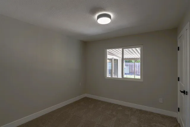 an empty room with a workbench
