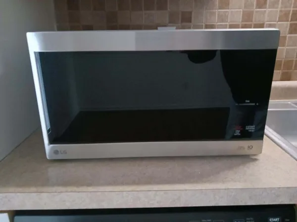 a utility room with a fireplace