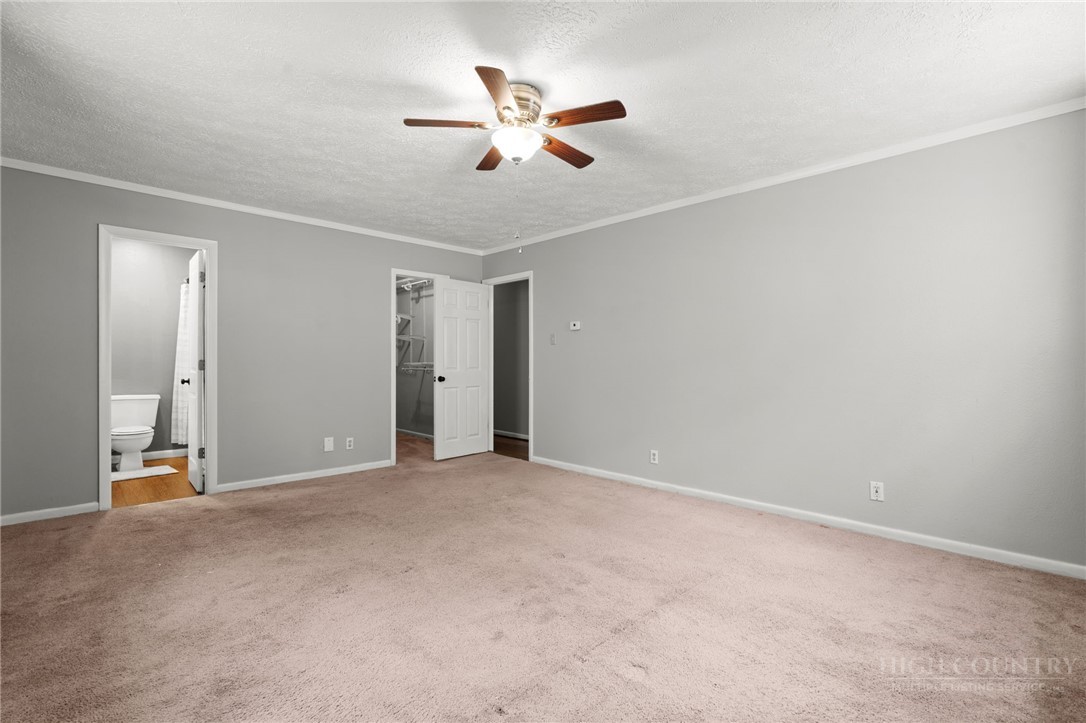 2345 Watauga River Road Sugar Grove, NC 28679 - Photo 15 of 50 a view of an empty room with a ceiling fan
