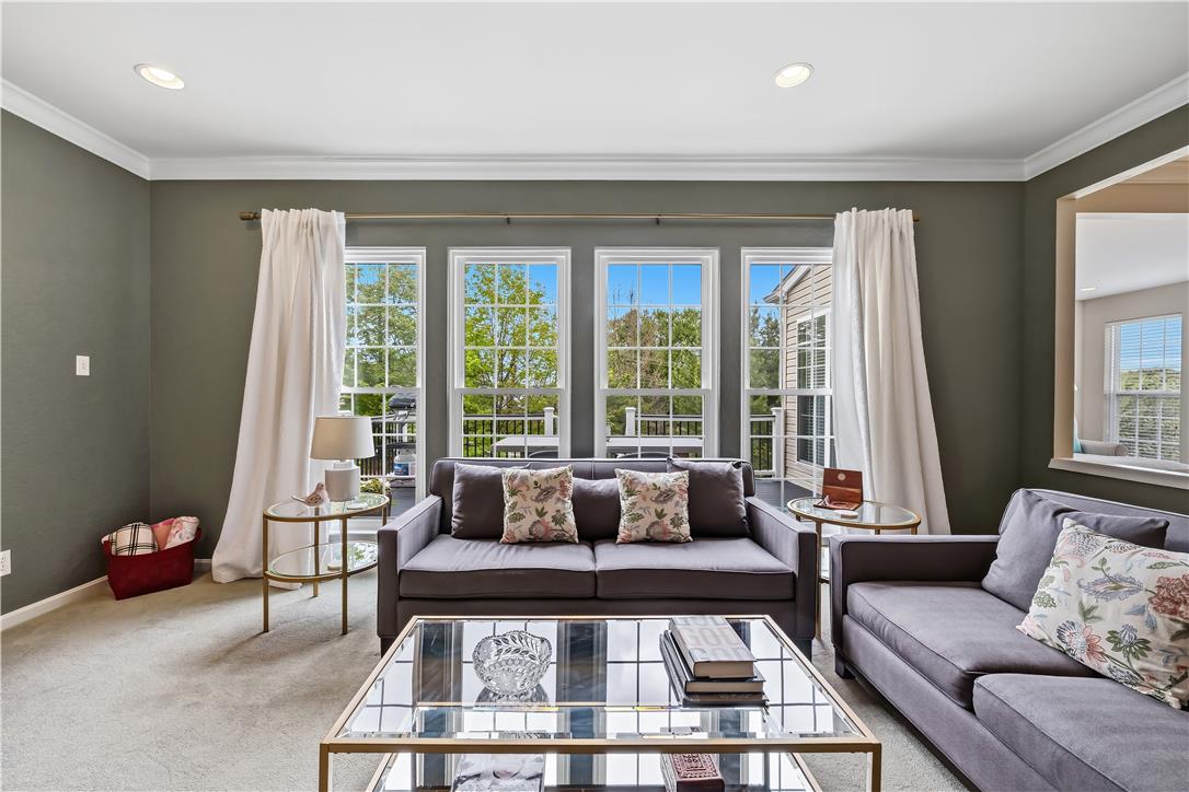 9031 Pathfinder Road Breinigsville, PA 18031 - Photo 24 of 63 Sun-filled living space offering ample views and comfortable seating for relaxed living.