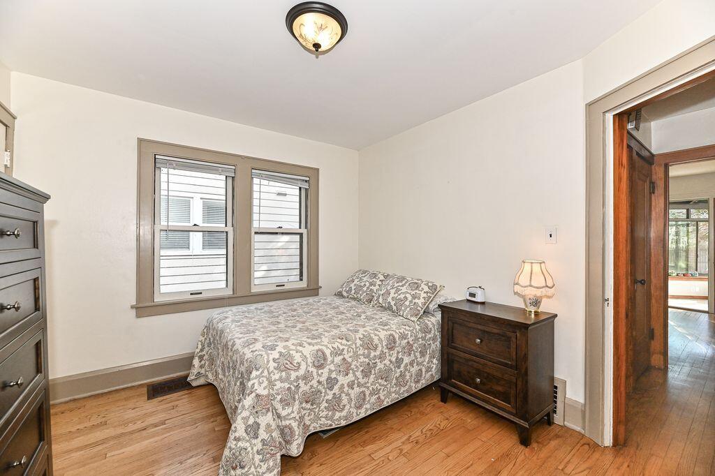 2715 Lasalle Street Racine, WI 53402 - Photo 17 of 35 Main floor bedroom, gorgeous hardwood flooring
