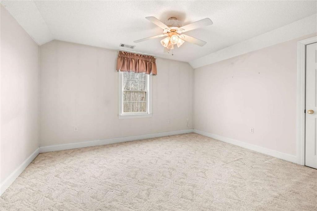 131 Caudell Drive Lula, GA 30554 - Photo 38 of 58 an empty room with a window