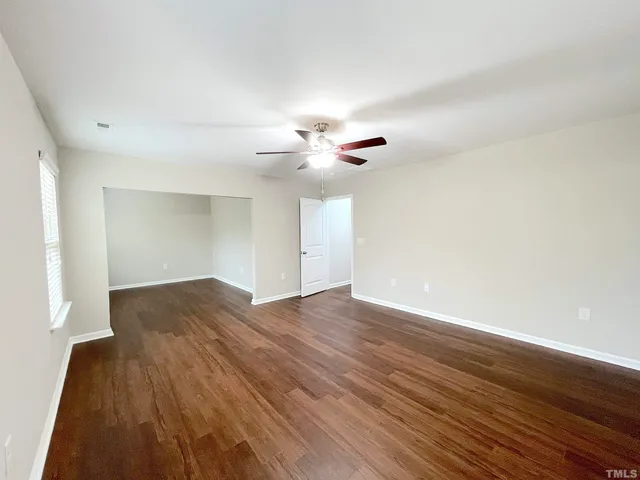 a bathroom with a granite countertop tub sink and shower