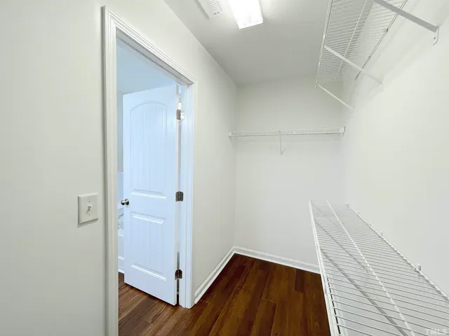 a view of small space with racks on the wall