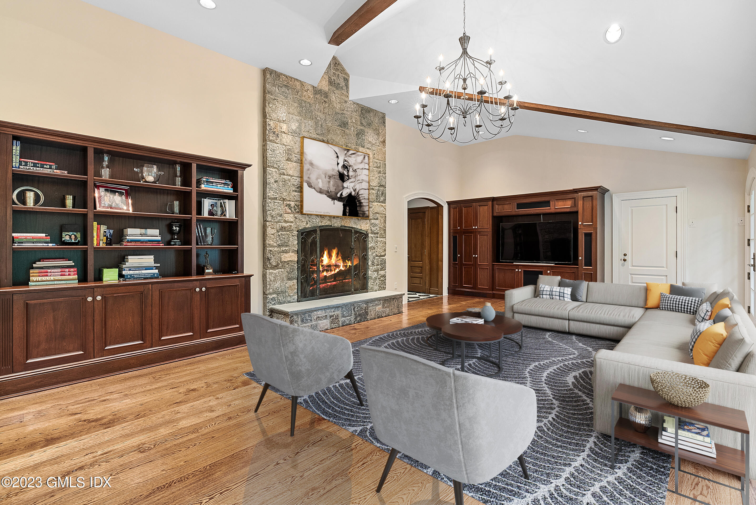 151 Clapboard Ridge Road Greenwich, CT 06831 - Photo 15 of 34 a living room with fireplace furniture and a flat screen tv