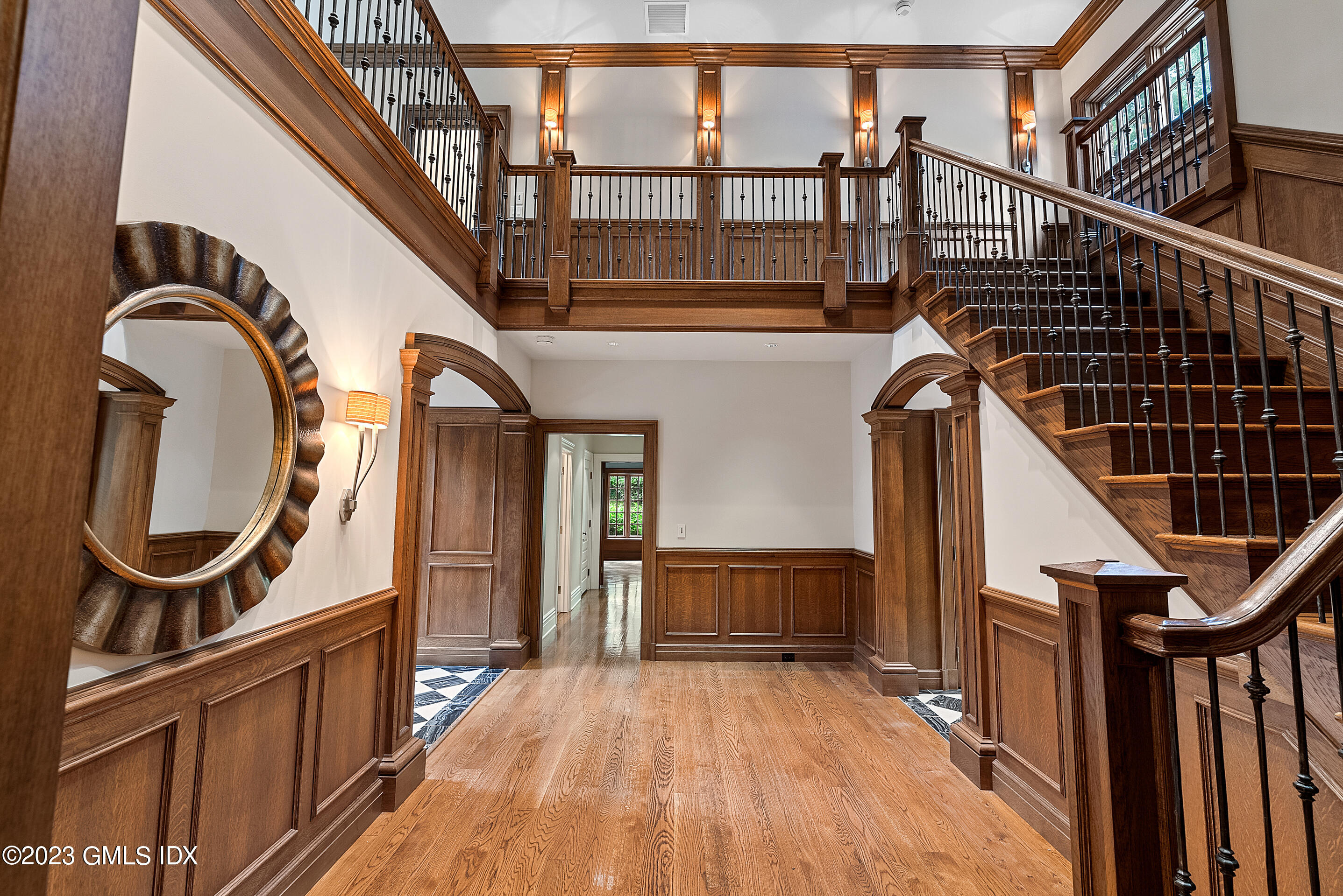 151 Clapboard Ridge Road Greenwich, CT 06831 - Photo 17 of 34 a view of an entryway with wooden floor and stairs