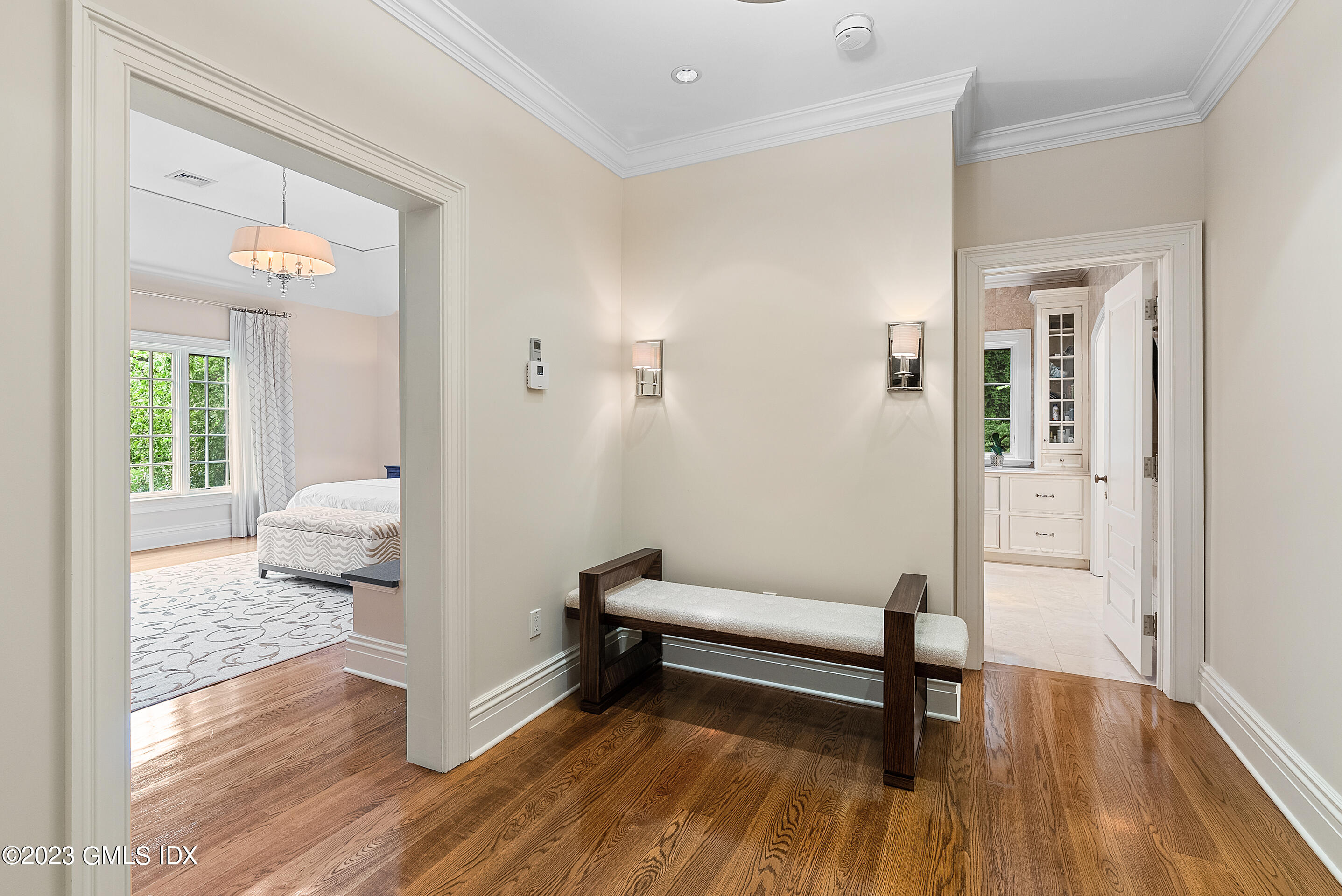 151 Clapboard Ridge Road Greenwich, CT 06831 - Photo 20 of 34 a bedroom with a bed and a window