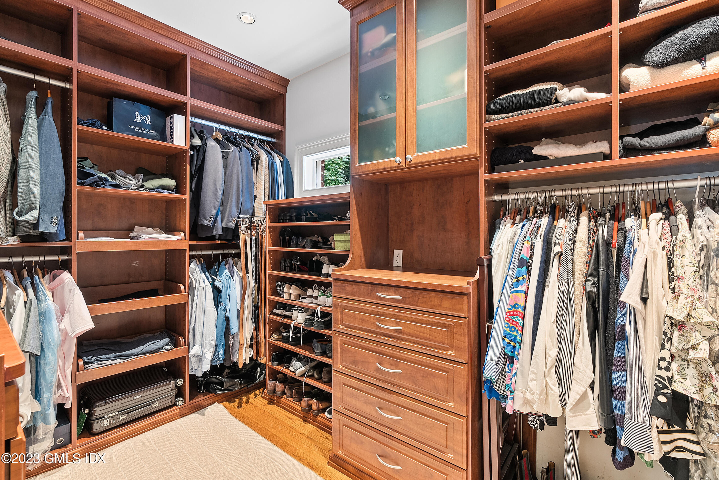 151 Clapboard Ridge Road Greenwich, CT 06831 - Photo 23 of 34 a view of walk in closet with clothes and shoes