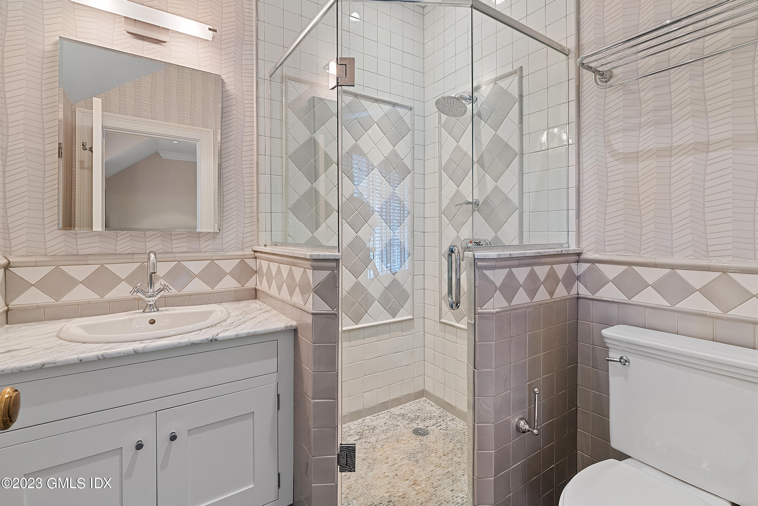 151 Clapboard Ridge Road Greenwich, CT 06831 - Photo 26 of 34 a bathroom with a sink toilet and shower