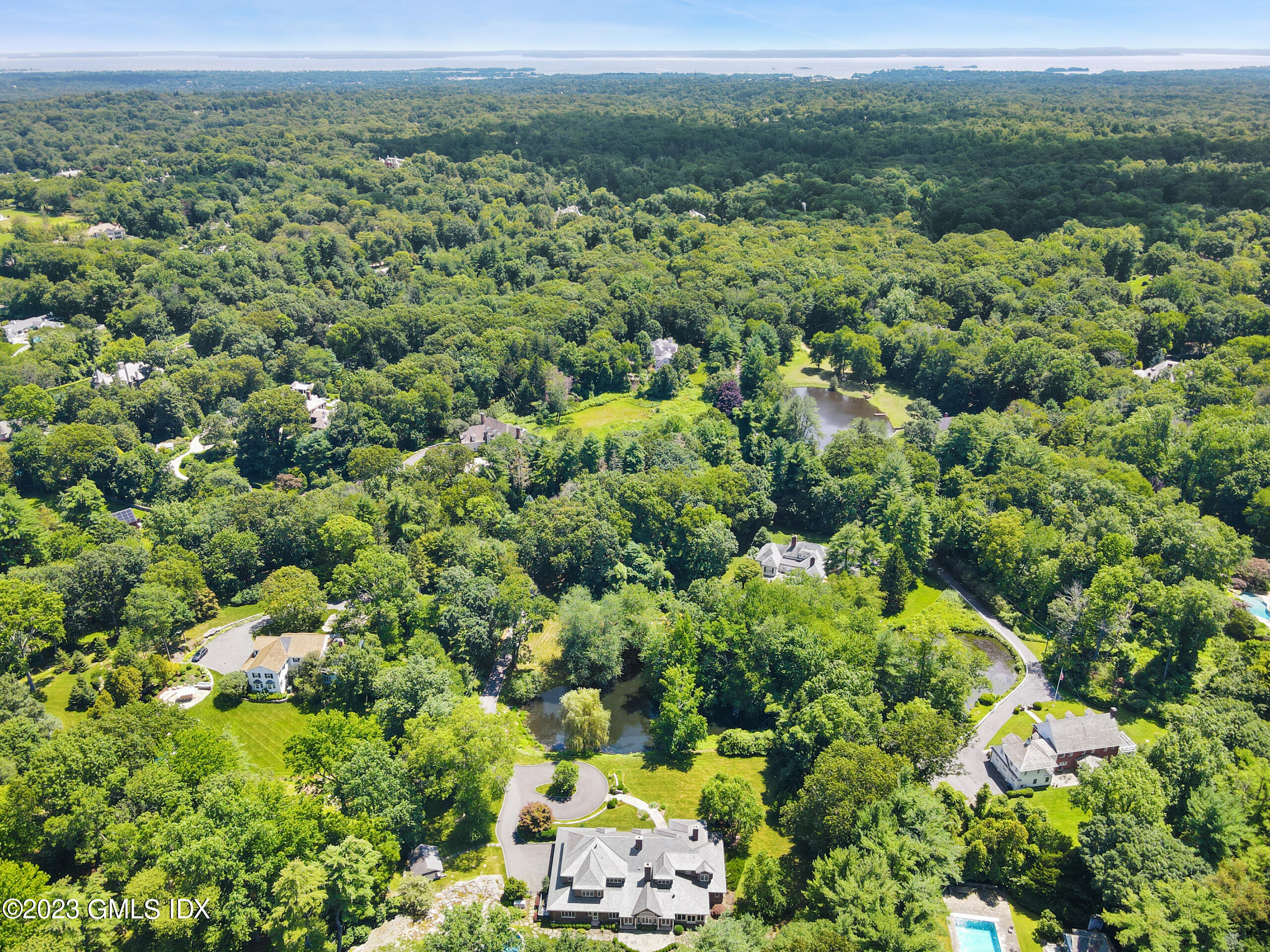 151 Clapboard Ridge Road Greenwich, CT 06831 - Photo 34 of 34 an aerial view of a houses with a yard