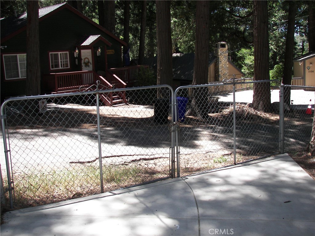 1101 Big Tree Lane Crestline, CA 92325 - Photo 6 of 30 a view of a house with backyard porch and sitting area