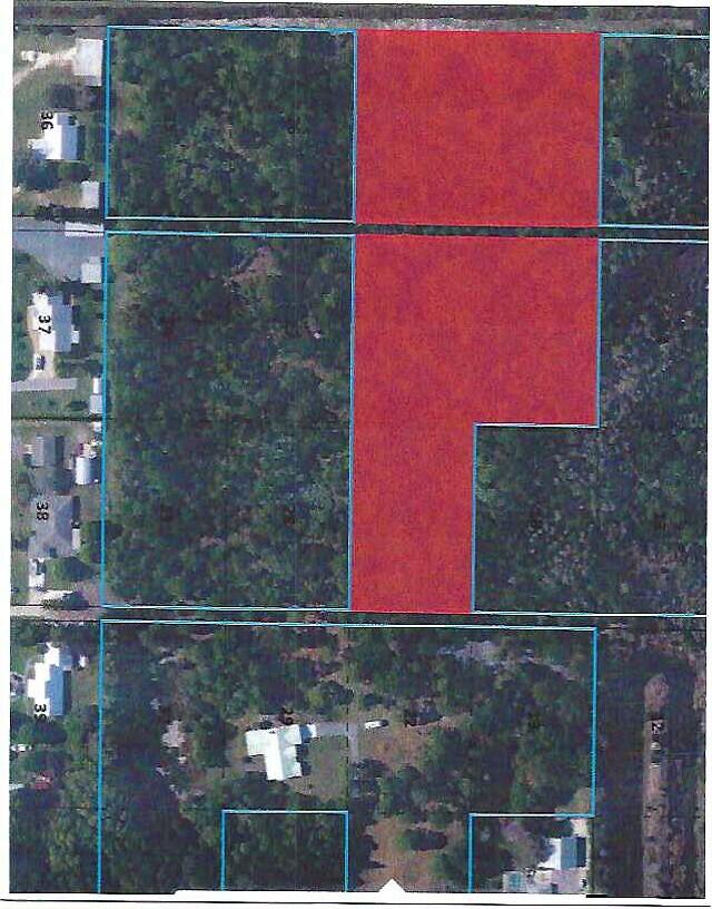 0 Southeast Flora Avenue Hobe Sound, FL 33455 - Photo 1 of 1 a bathroom with a shower