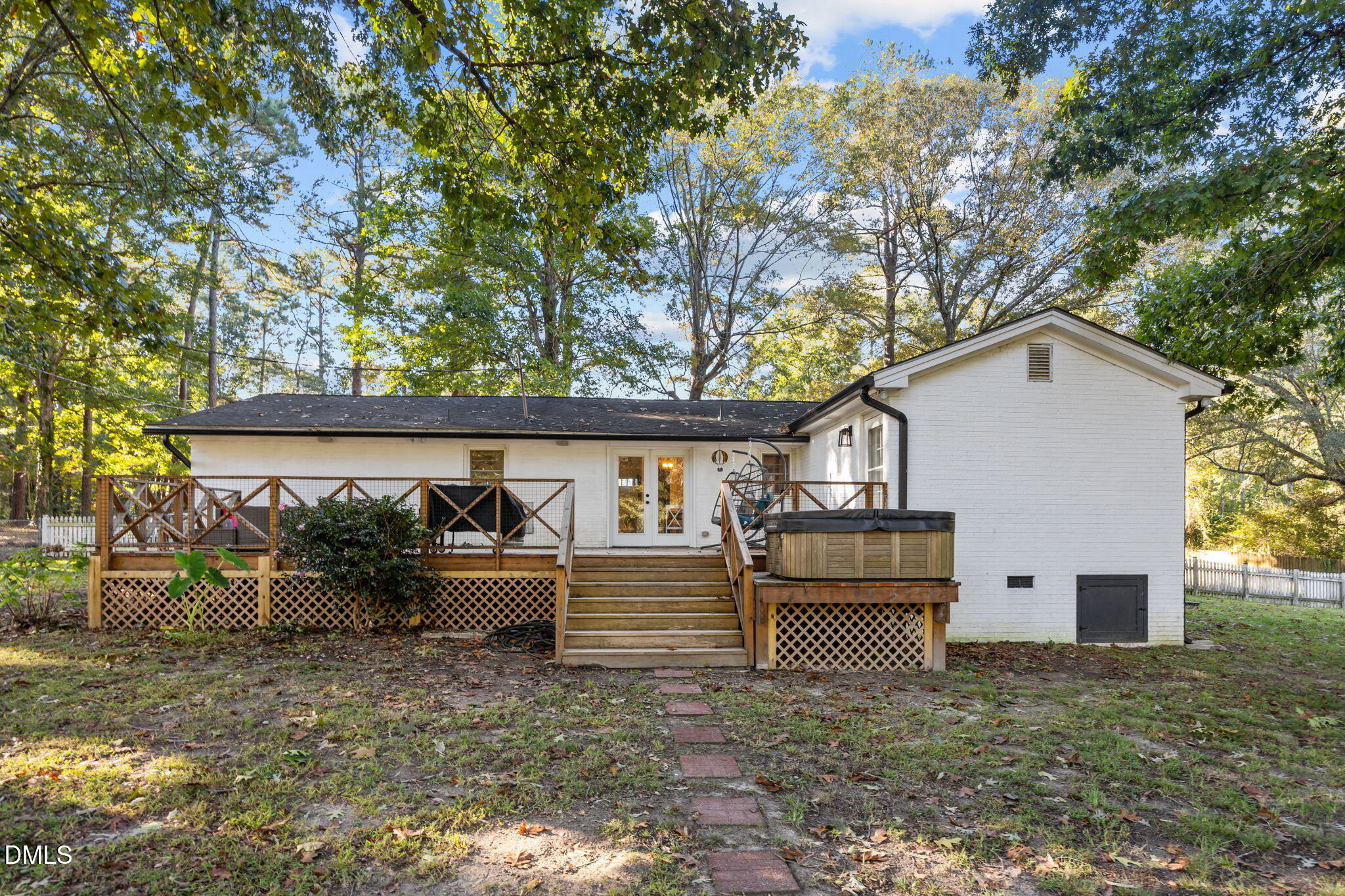 9433 Ferrell Road Zebulon, NC 27597 - Photo 23 of 38 Sturdy & sprawling rear deck providing ample space for entertaining or coffee in the morning!
