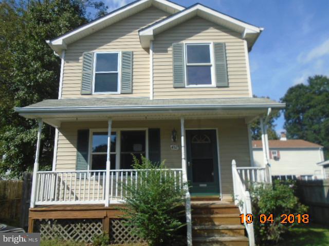 432 Salisbury Road Edgewater, MD 21037 - Photo 1 of 8 a front view of a house with a garden