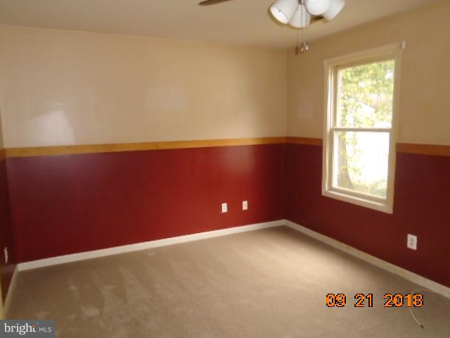 432 Salisbury Road Edgewater, MD 21037 - Photo 8 of 8 an empty room with windows