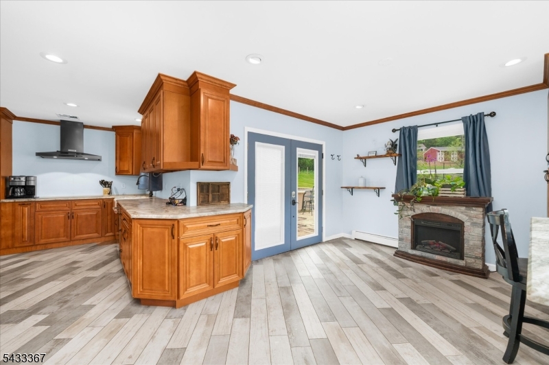 650 Woodglen Road Glen Gardner, NJ 08826 - Photo 10 of 28 a large kitchen with stainless steel appliances granite countertop a stove a sink and a microwave