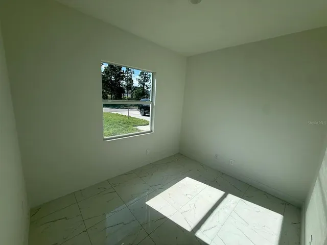 an empty room with an empty space