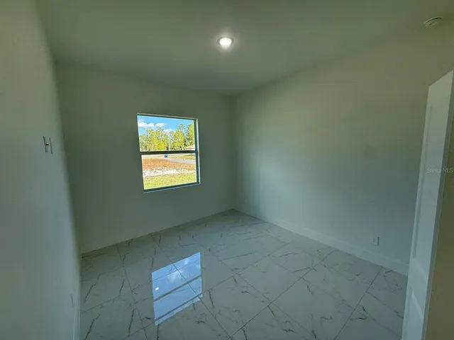 $2,800 | 1121 Florence Street East, Lehigh Acres, FL 33974