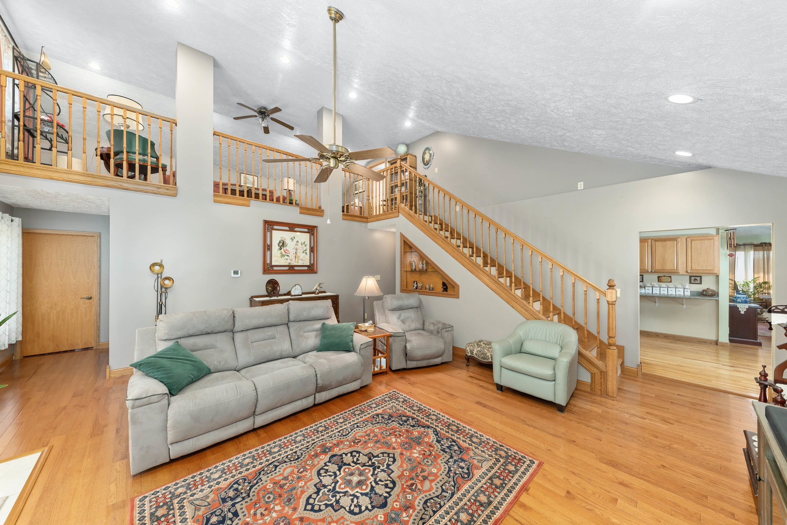 26310 South McKinley Woods Road Channahon, IL 60410 - Photo 14 of 49 a living room with furniture and wooden floor