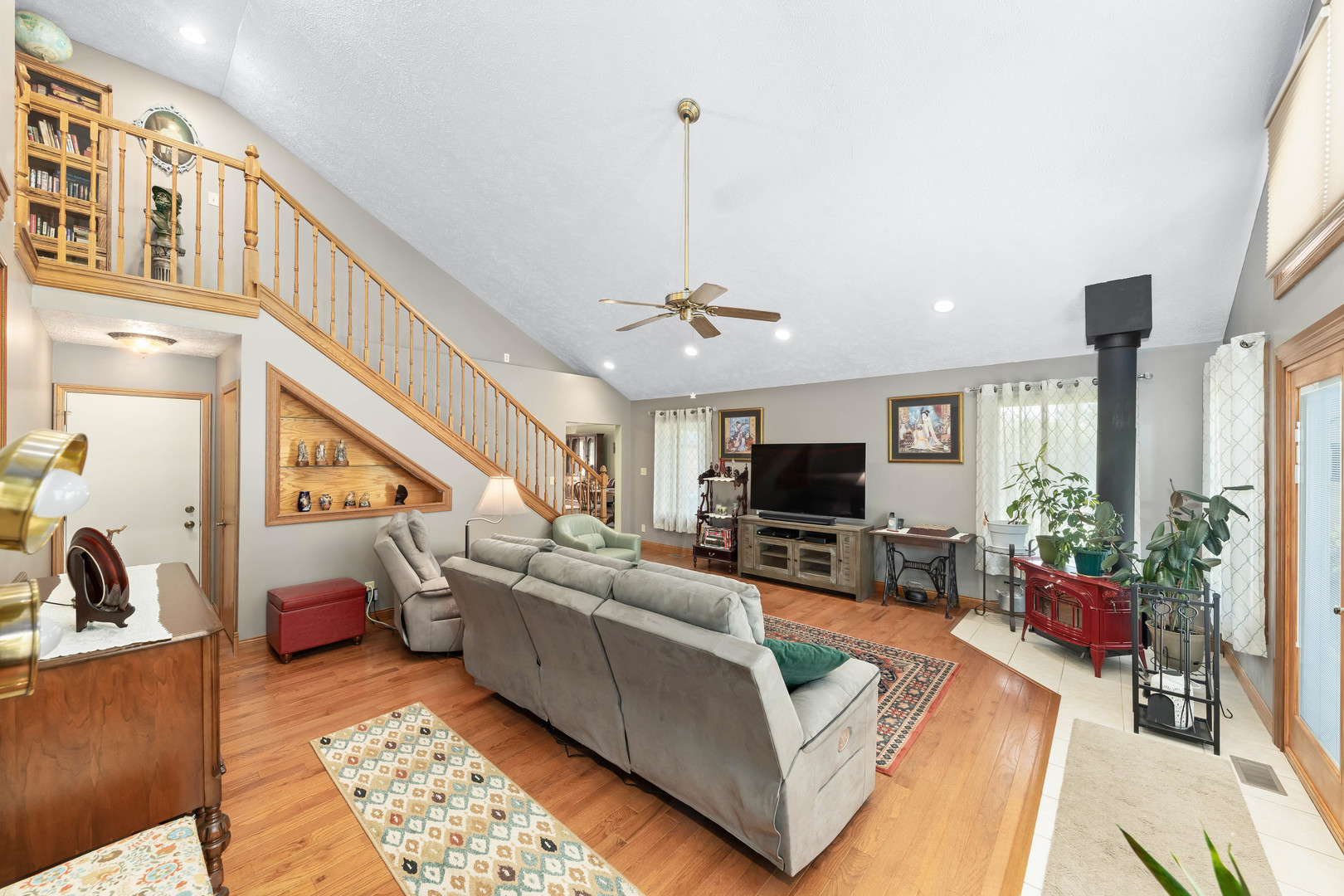 26310 South McKinley Woods Road Channahon, IL 60410 - Photo 15 of 49 a living room with furniture or couch and a flat screen tv