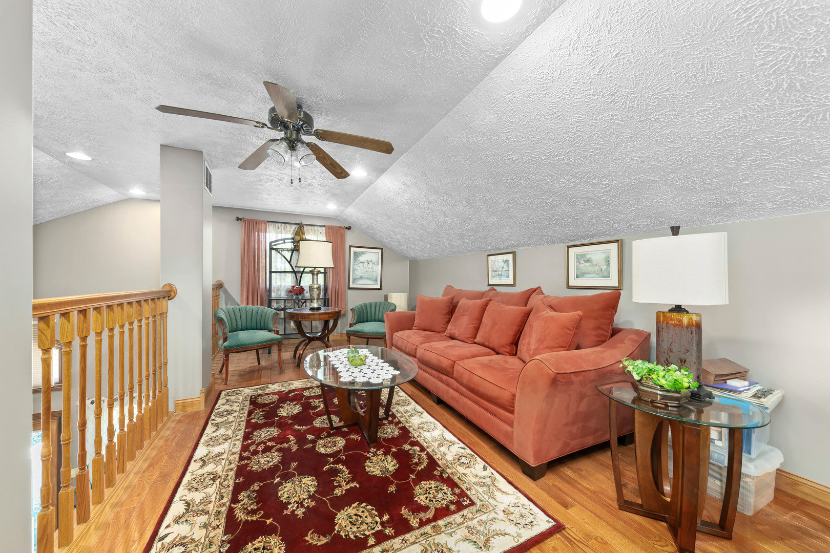 26310 South McKinley Woods Road Channahon, IL 60410 - Photo 18 of 49 a living room with furniture and a rug