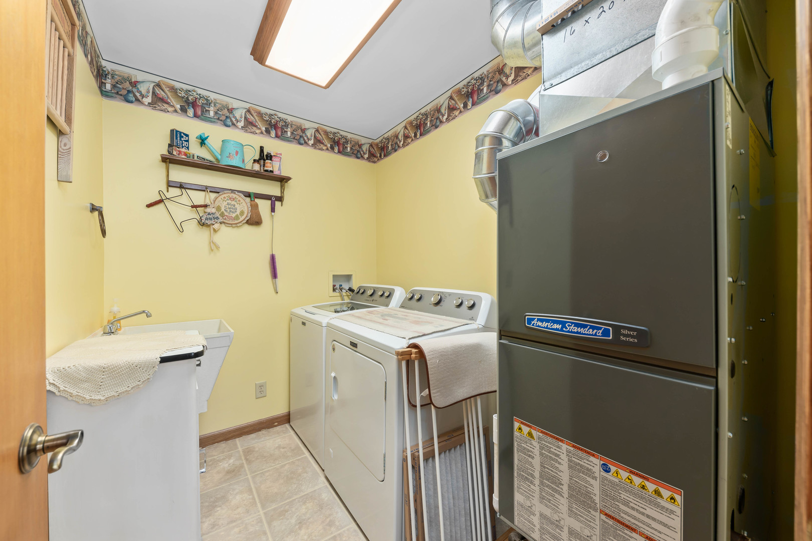 26310 South McKinley Woods Road Channahon, IL 60410 - Photo 29 of 49 a utility room with dryer and washer