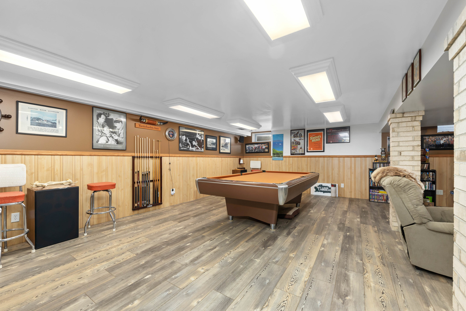 26310 South McKinley Woods Road Channahon, IL 60410 - Photo 31 of 49 a living room with couch and a wooden floor