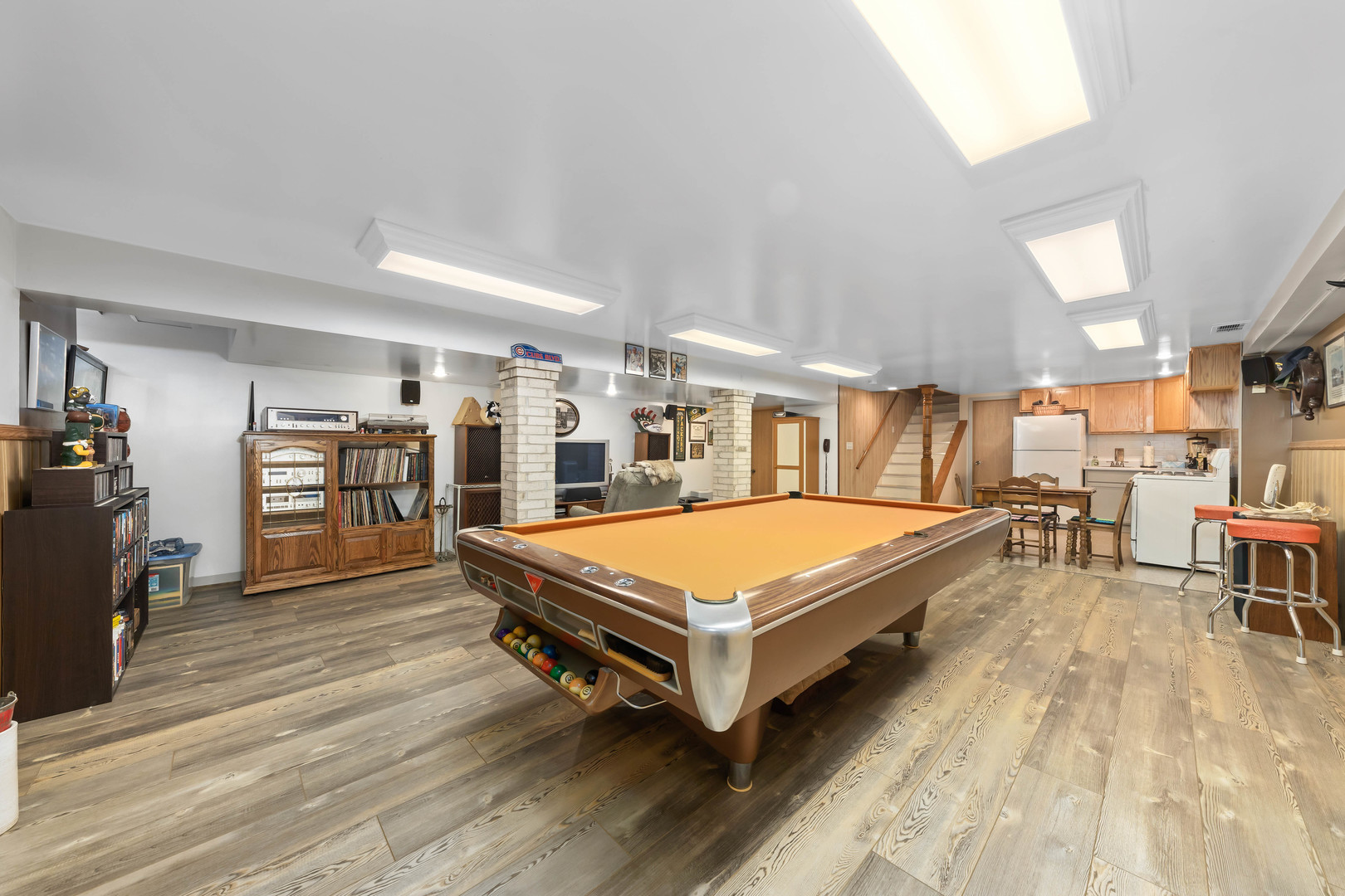 26310 South McKinley Woods Road Channahon, IL 60410 - Photo 32 of 49 a room with pool table and wooden floor