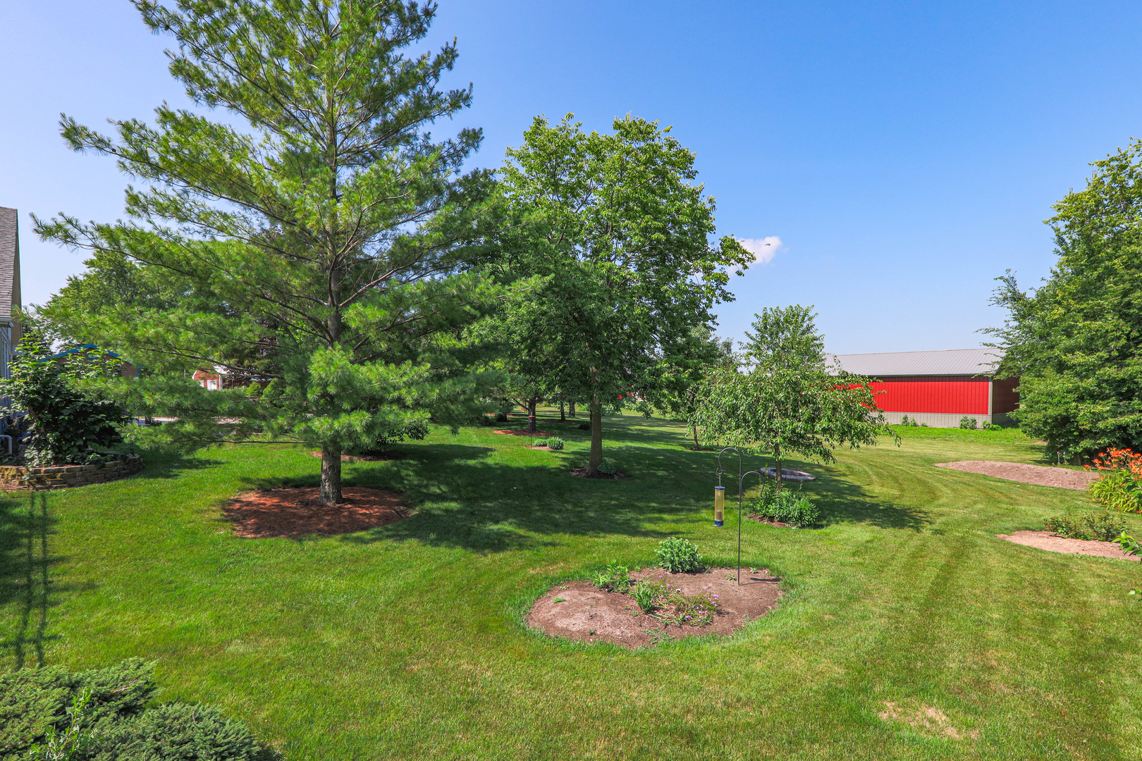 26310 South McKinley Woods Road Channahon, IL 60410 - Photo 39 of 49 a green field with lots of trees