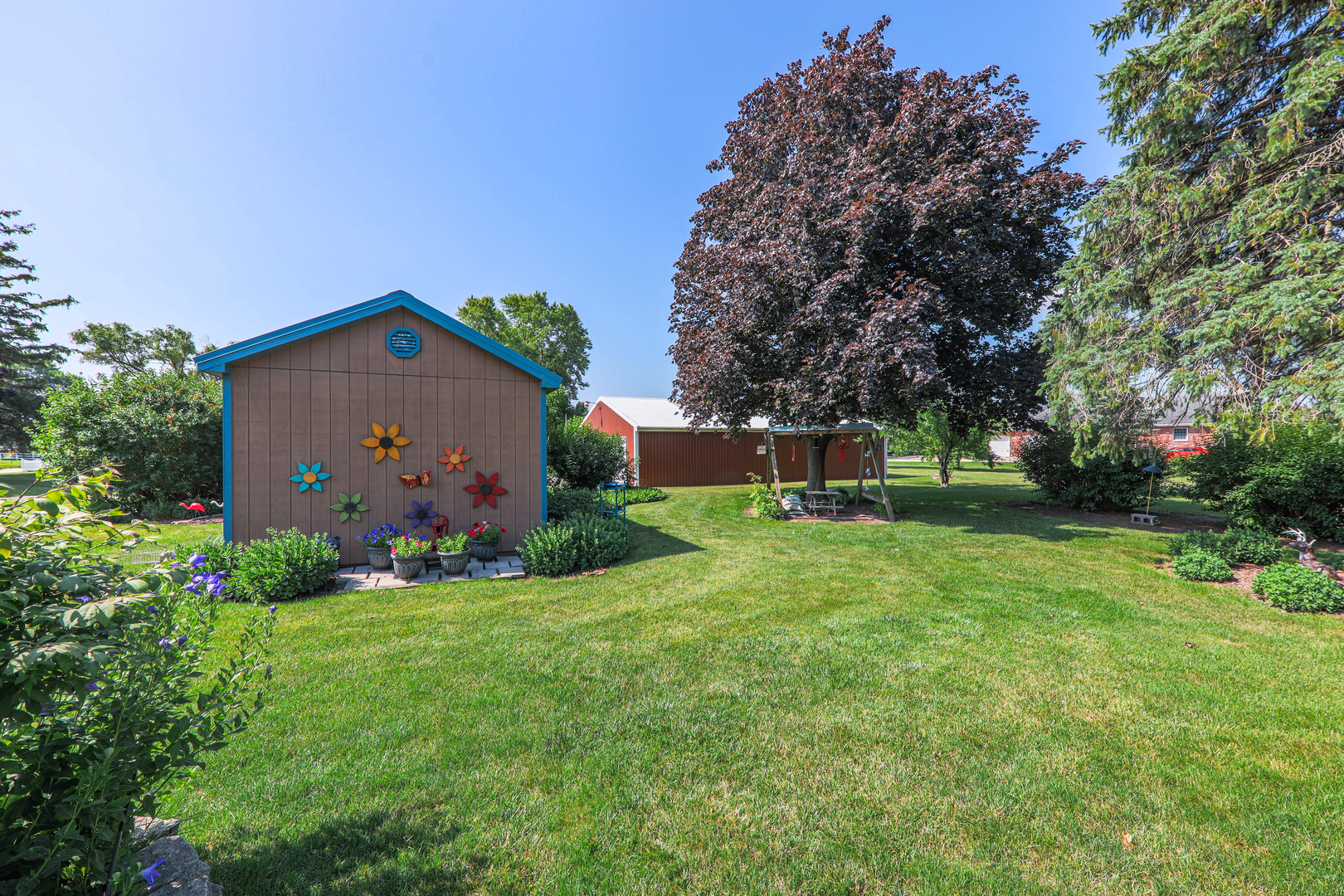 26310 South McKinley Woods Road Channahon, IL 60410 - Photo 42 of 49 a front view of house with garden