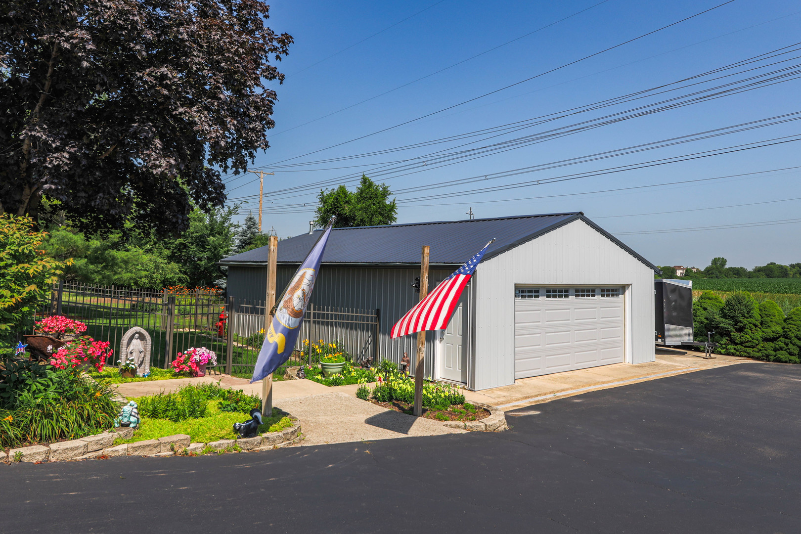 26310 South McKinley Woods Road Channahon, IL 60410 - Photo 46 of 49 a front view of a house with a garage