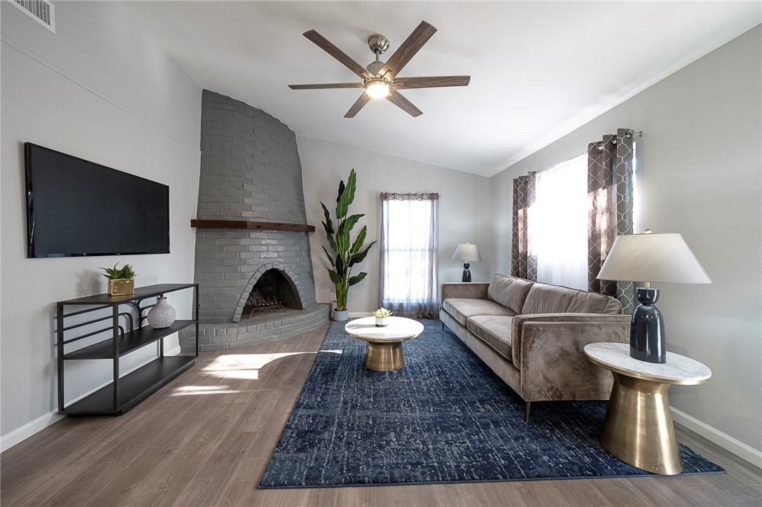 4900 Hawk Cove, Unit A Austin, TX 78745 - Photo 3 of 23 a living room with furniture and a flat screen tv
