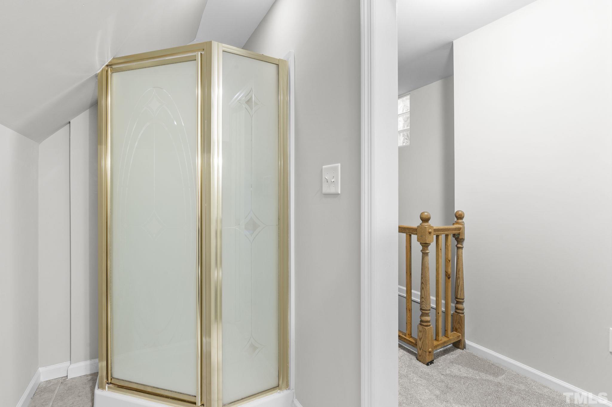 805 Van Thomas Drive Raleigh, NC 27615 - Photo 24 of 38 a view of a bathroom with a door