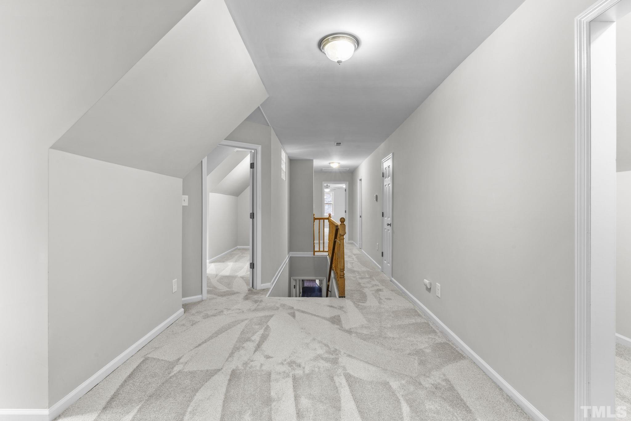 805 Van Thomas Drive Raleigh, NC 27615 - Photo 26 of 38 a view of a room with wooden floor