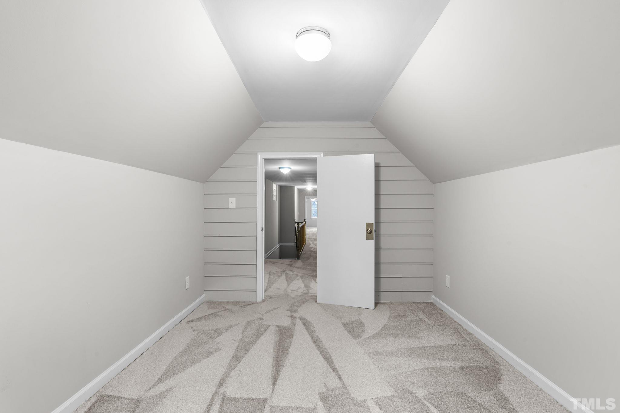 805 Van Thomas Drive Raleigh, NC 27615 - Photo 33 of 38 a view of a hallway to an empty room