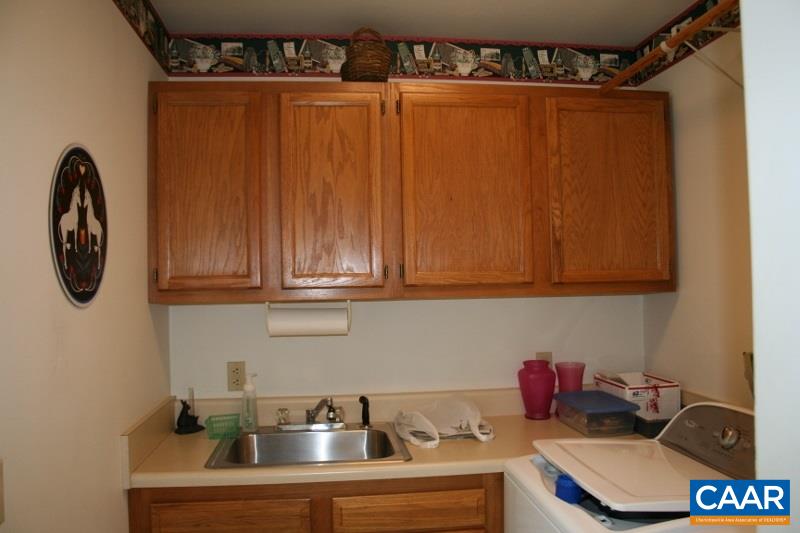 429 Beautiful Run Road Rochelle, VA 22738 - Photo 13 of 30 a kitchen with a sink and cabinets