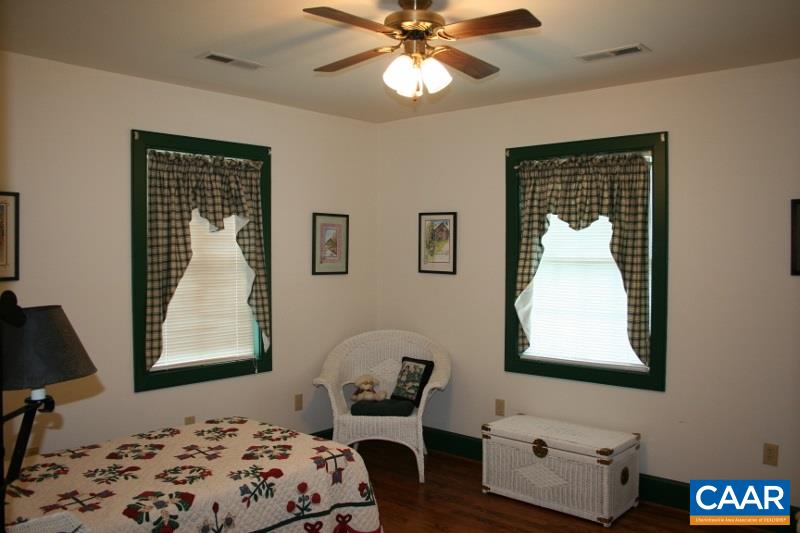 429 Beautiful Run Road Rochelle, VA 22738 - Photo 17 of 30 a bedroom with a bed and furniture