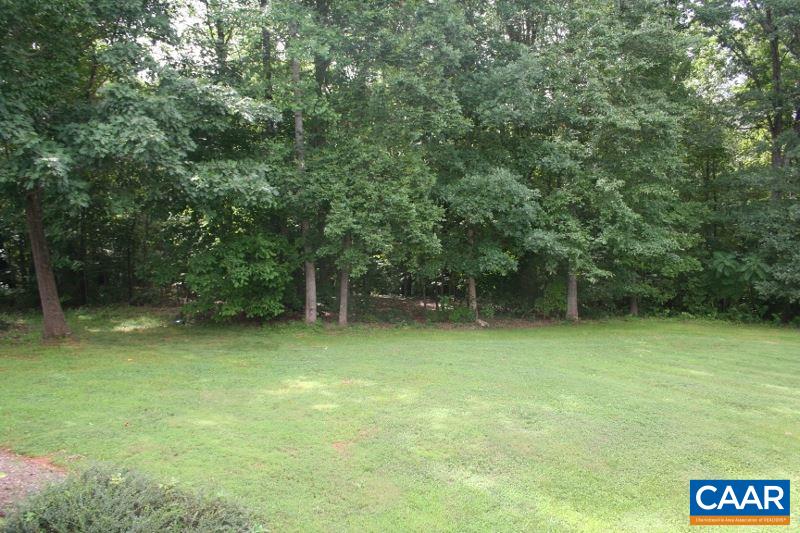 429 Beautiful Run Road Rochelle, VA 22738 - Photo 25 of 30 a backyard of a house with lots of green space and fountain