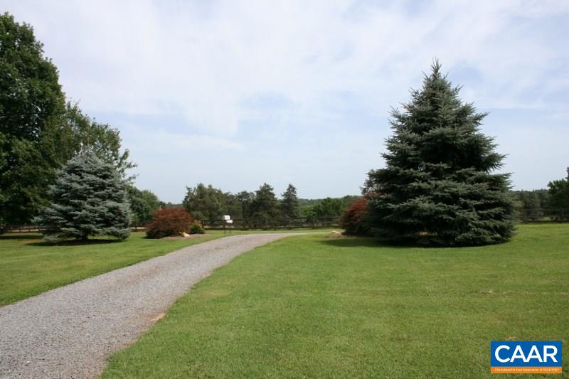 429 Beautiful Run Road Rochelle, VA 22738 - Photo 29 of 30 a view of a golf course with a garden