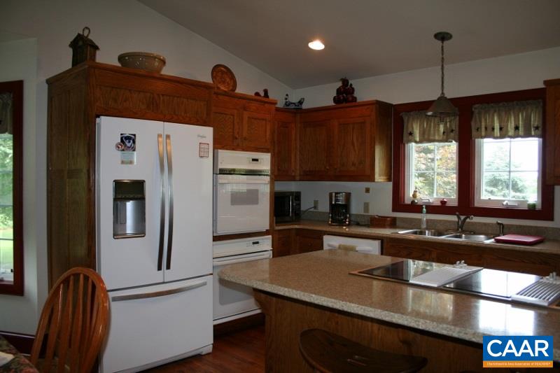 429 Beautiful Run Road Rochelle, VA 22738 - Photo 7 of 30 a kitchen with refrigerator and window