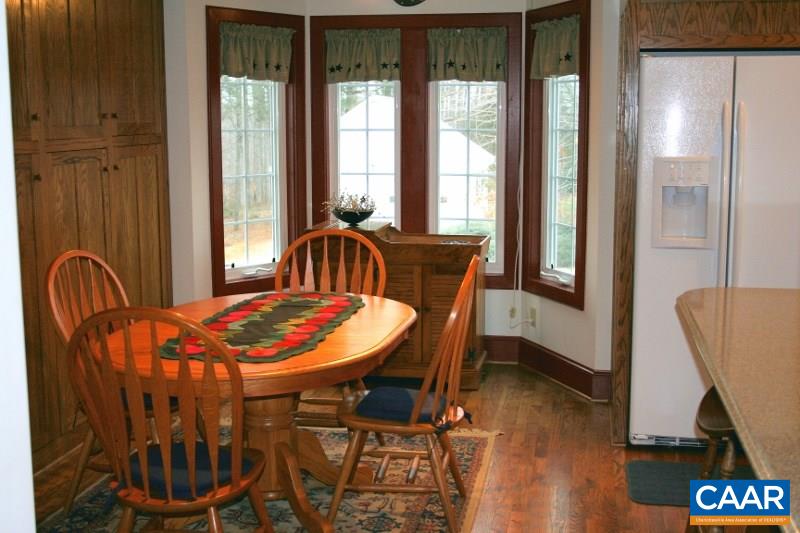 429 Beautiful Run Road Rochelle, VA 22738 - Photo 8 of 30 a view of a dining room with furniture window and wooden floor
