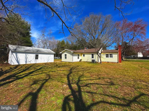 a front view of house with yard