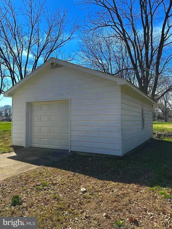 a house view with a backyard space