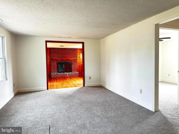 a view of an empty room with window