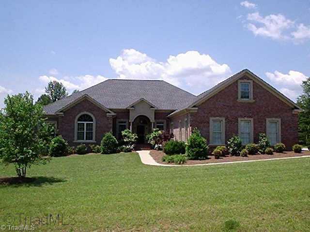 4909 Robdot Drive Oak Ridge, NC 27310 - Photo 1 of 9 Exterior Front.
