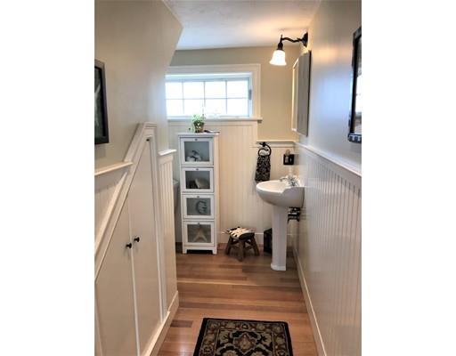 54 Lighthouse Road Scituate, MA 02066 - Photo 12 of 30 a bathroom with a sink and a mirror