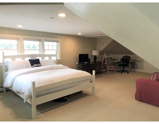 54 Lighthouse Road Scituate, MA 02066 - Photo 23 of 30 a bedroom with a bed and chair
