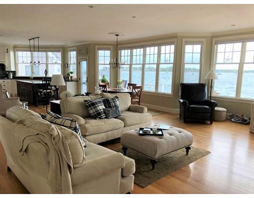 54 Lighthouse Road Scituate, MA 02066 - Photo 5 of 30 a living room with furniture and large windows